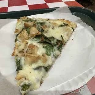 Chicken Alfredo pizza slice