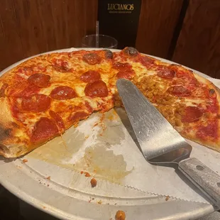 Medium New York style pepperoni and sausage on half