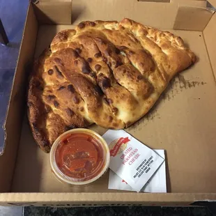 Luciano&apos;s Calzone pic little too crisp but great and savory on the inside