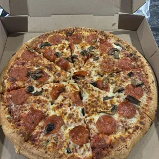 Pepperoni and mushroom pizza