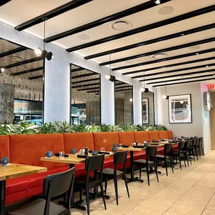 a restaurant with tables and chairs