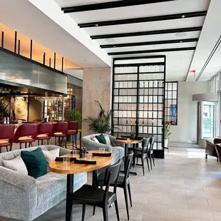 a restaurant with tables and chairs