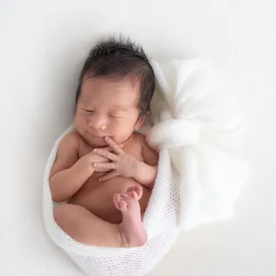Newborn baby - we got plenty of wraps and swaddles.