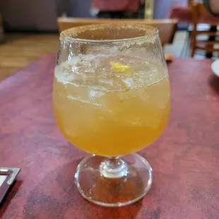 Pumpkin spice infused rye whiskey with pear simple syrup and cinnamon sugar rim