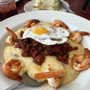 Shrimp and jalapeño grits with a fried egg on top. Really yummy, but wouldn&apos;t get another egg from here as the bottom was basically burnt.