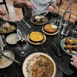 Flounder w/some gumbo goodness, pork chops w/veggies, smothered steaks , Mac &amp; cheese and hot cornbread.