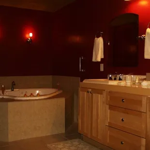 Soak your troubles away in this whirlpool for two in the Country Suite.
