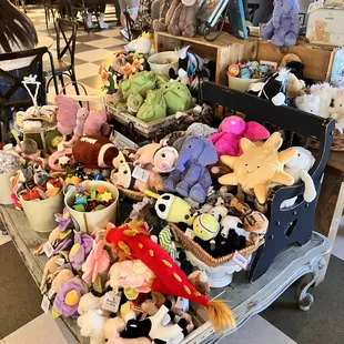 a table full of stuffed animals