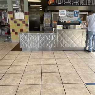 a man standing at the counter