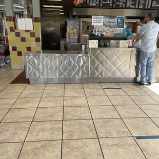 a man standing at the counter