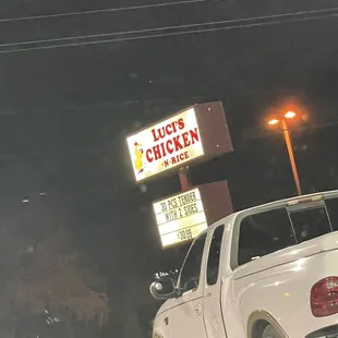 a truck parked in front of a restaurant