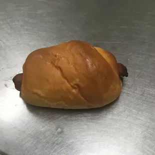 a hot dog on a bun