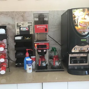 a coffee machine and a soda machine