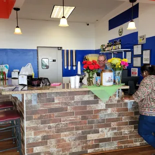 a woman sitting at a counter