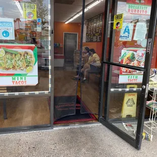 the front door of a taco shop