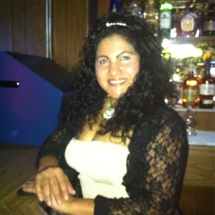 a woman with curly hair