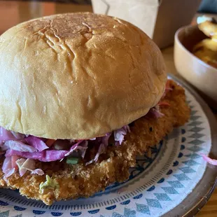 Chicken Katsu Sando - CK $8.95 Crispy chicken breast, asian slaw, Luck's sauce, tonkatsu ketchup, Kings hawaiian sweet bun