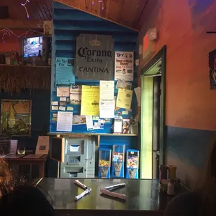 a neon sign above the counter