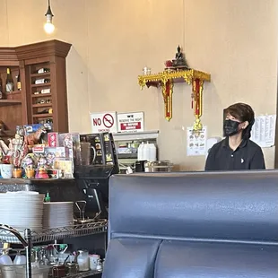ACTING LIKE SHE DOES NOT HEAR US ASKING FOR HELP OR DOESNT SEE THAT WE ARE READY TO PAY.