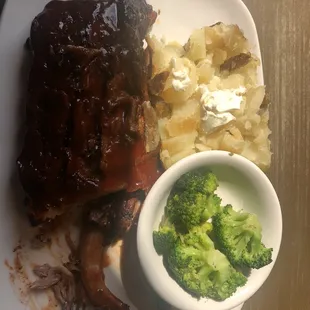 Half rack, baked potato and steamed broccoli.