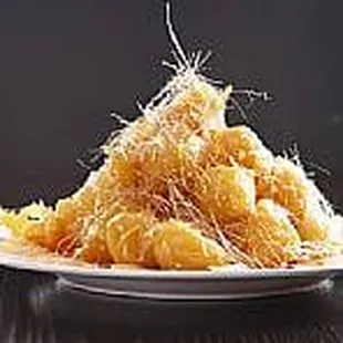 a pile of fried shrimp on a plate