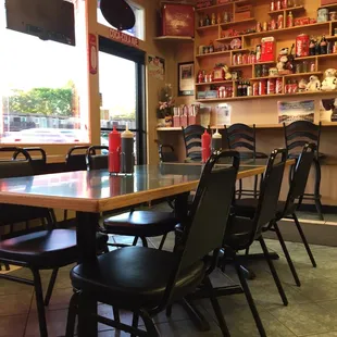 Some seating and the Coca-Cola memorabilia collection