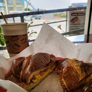 Dine in: a medium coffee with a Croissant Breakfast Sandwich (bacon, egg, and cheese).
