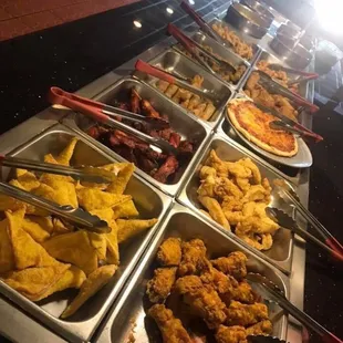 a variety of food in trays