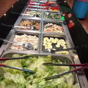 a buffet with many different types of food