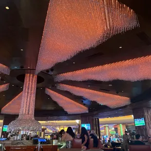 a woman sitting at a bar