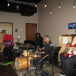 a group of men playing instruments