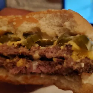 Burger with house sauce and jalapeños