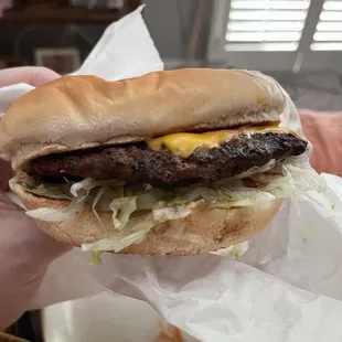 1/4 lb with cheese, ketchup, lettuce, onion