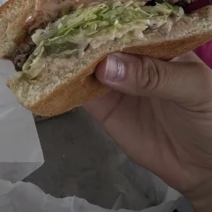 1/2 of a 1/4 lb. thousand island lucky boy burger.