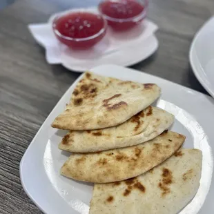Pita and raspberry vinaigrette dressing