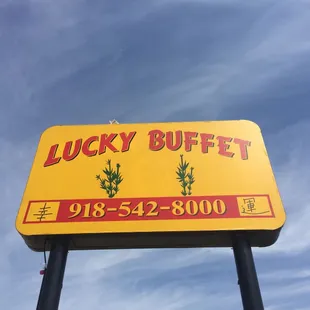 the sign for lucky buffet