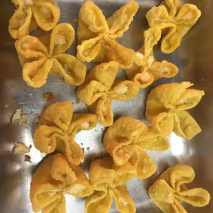 a close up of a bowl of fried food