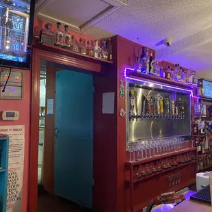 a bar with neon lights