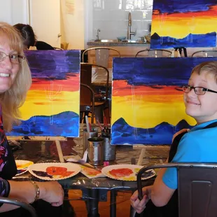 Love when mom and son can bond over painting at our All Ages Public Paint Sessions!
