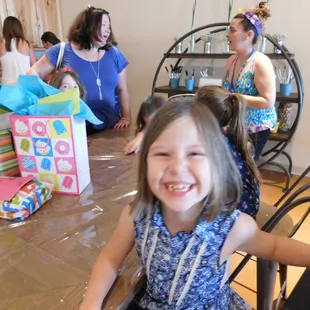 Cheese!  Kids&apos; birthday parties have built in time for cake and presents!