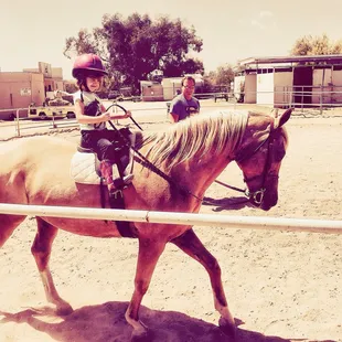 Daisy, at age 3, one of our younger riders learning to ride. We are now teaching the children of our former students.