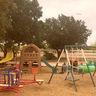 We have a playground to entertain younger siblings while they are waiting.