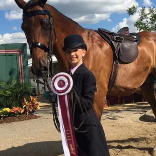 Taken by Scott Scheyli after a National event of my daughter and our horse