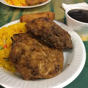 Egg Foo Young with a very dark gravy.