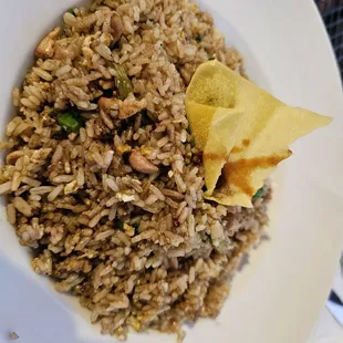 a bowl of fried rice and a tortilla