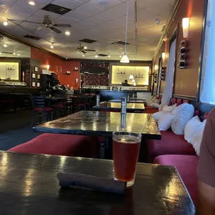 a man sitting at a table in a restaurant