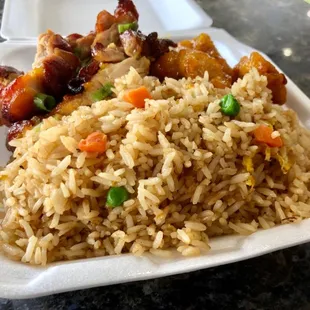 Combination with fried rice, teriyaki chicken and orange chicken