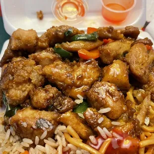 a plate of chicken and rice