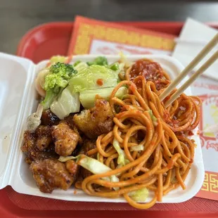 Chow mein with spicy orange chicken and shrimp