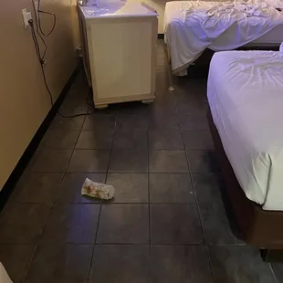 The rat was behind the dresser inside the refrigerator area